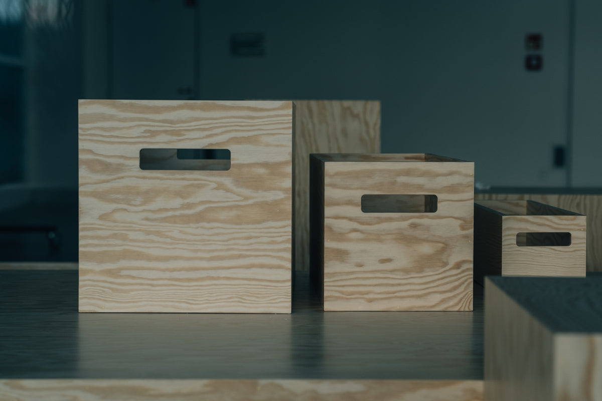 wooden boxes in all sizes on a table