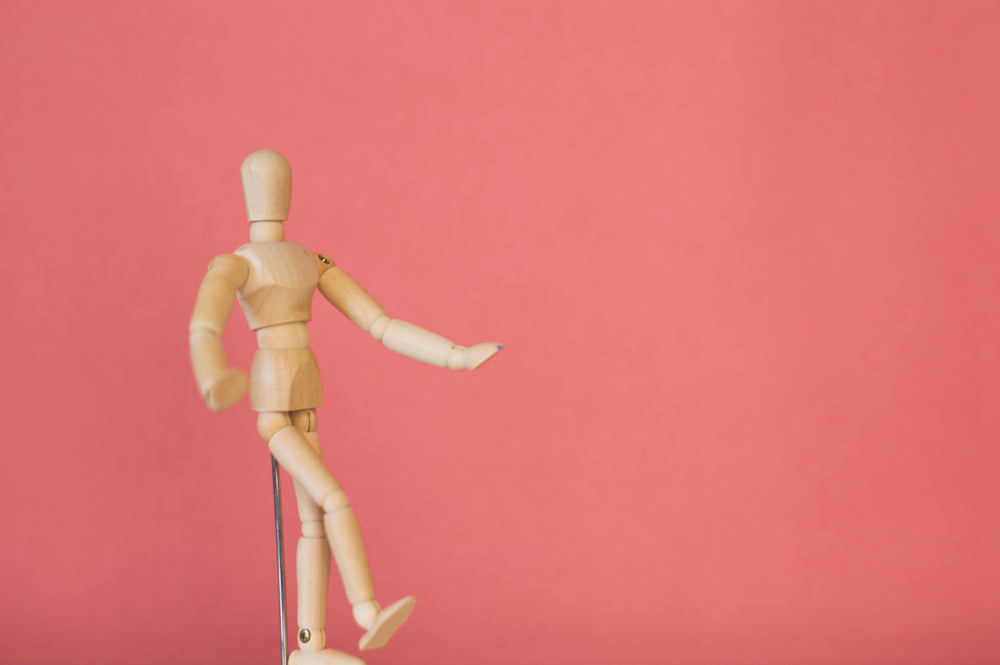 wooden model in standing pose