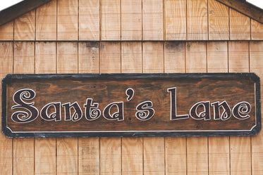 wooden sign santas' lane