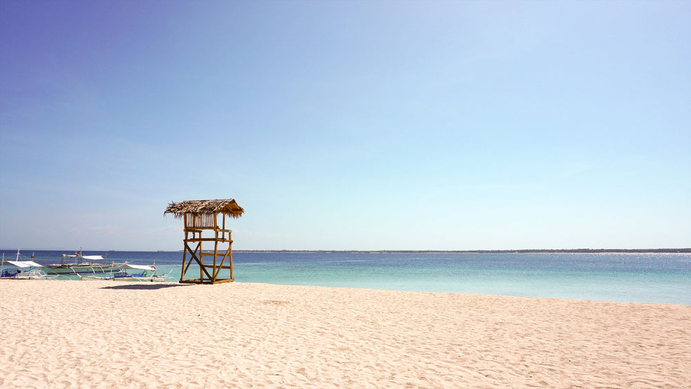 wooden structure on the beach