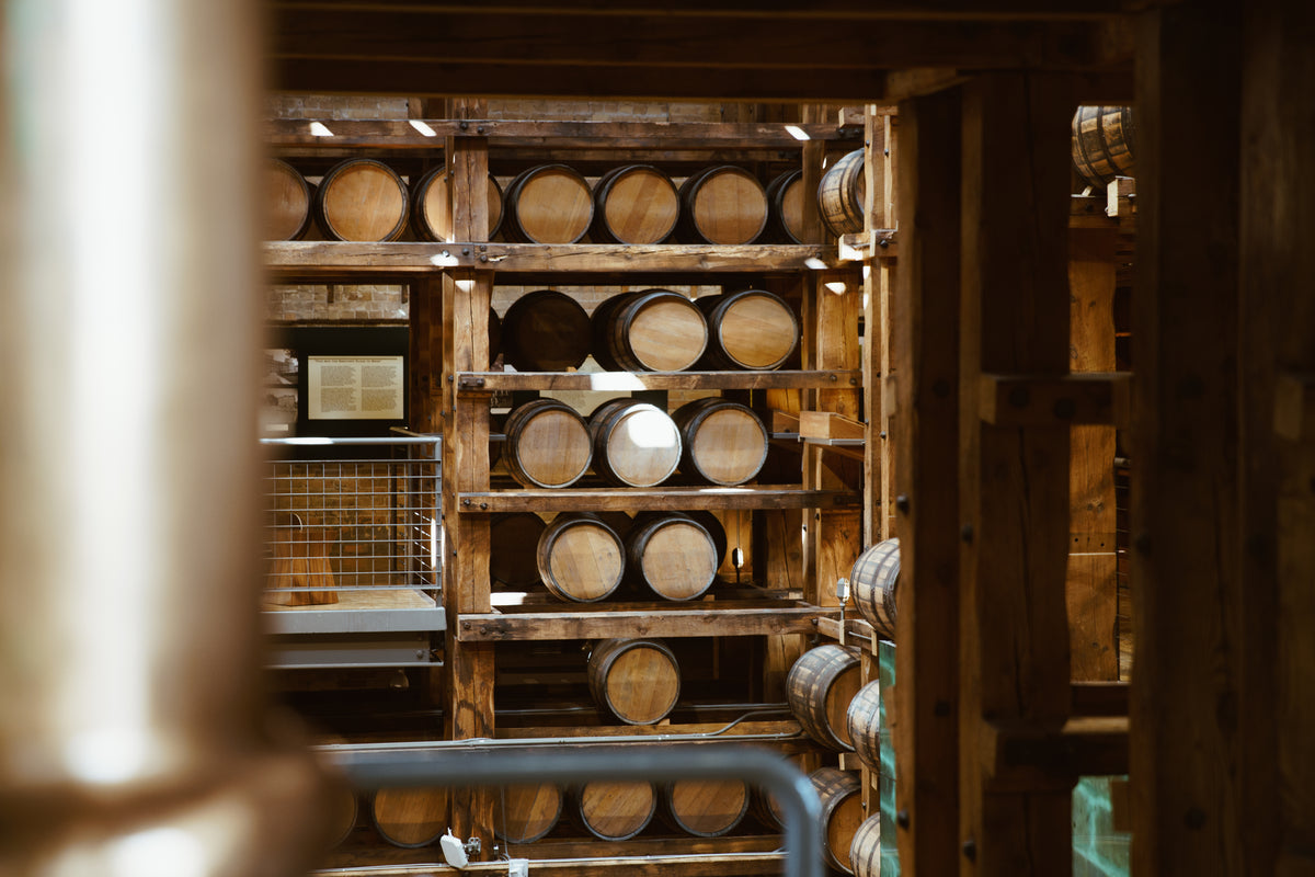 wooden wine barrels on shelf
