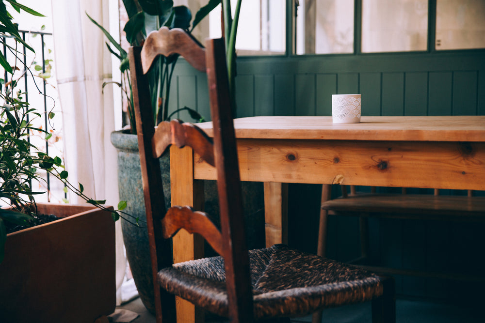 woven chair by table