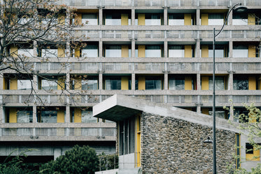 yellow and beige apartment building and balconies