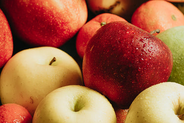 yellow and red apples fill the frame