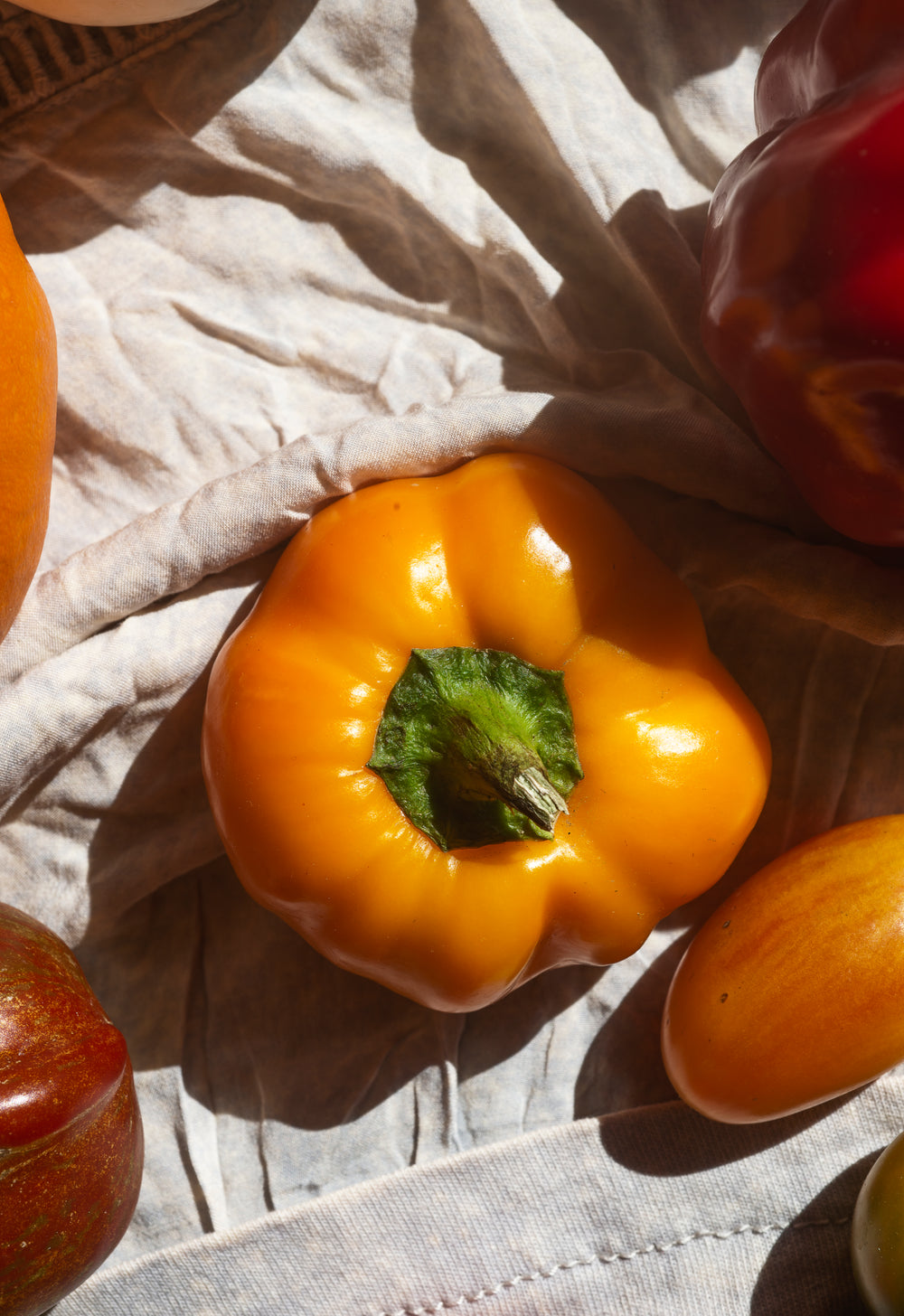 yellow bell pepper viewed from above on white