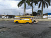 yellow car in tropics