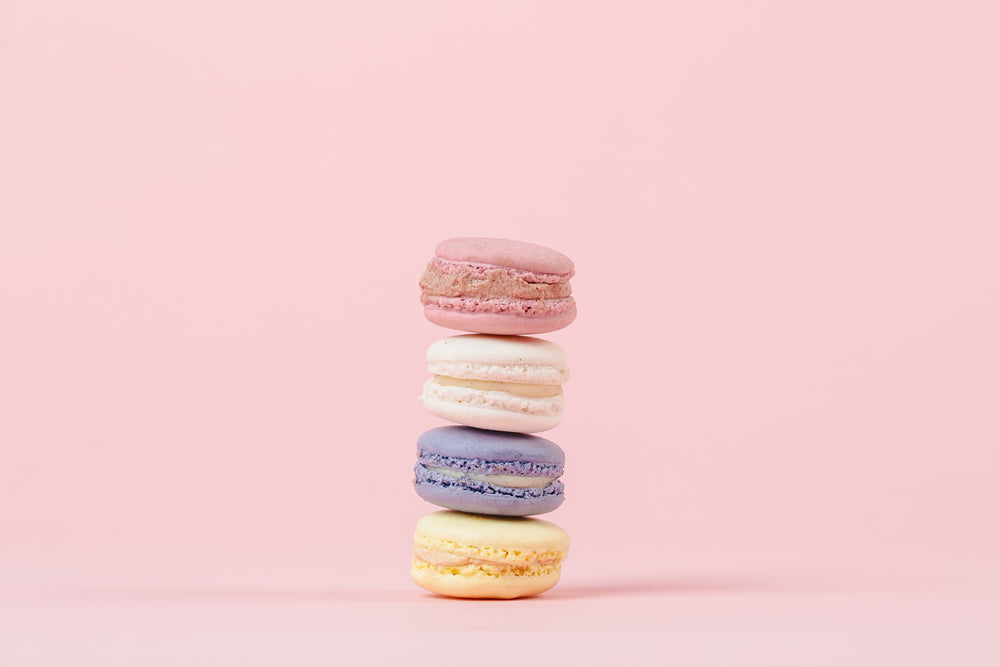 yellow purple pink and cream macarons