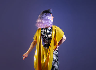 yellow shawl draped on drag performer