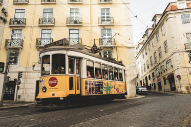 yellow streetcar in portugal