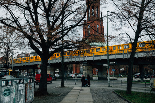 yellow subway train over downtown