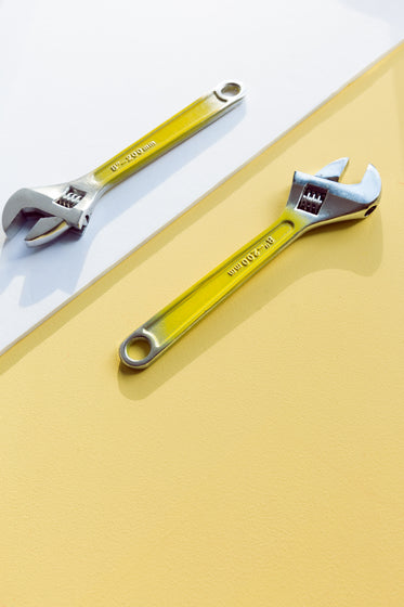 yellow tools on white and yellow background