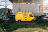 yellow van brightening nearby parking spots