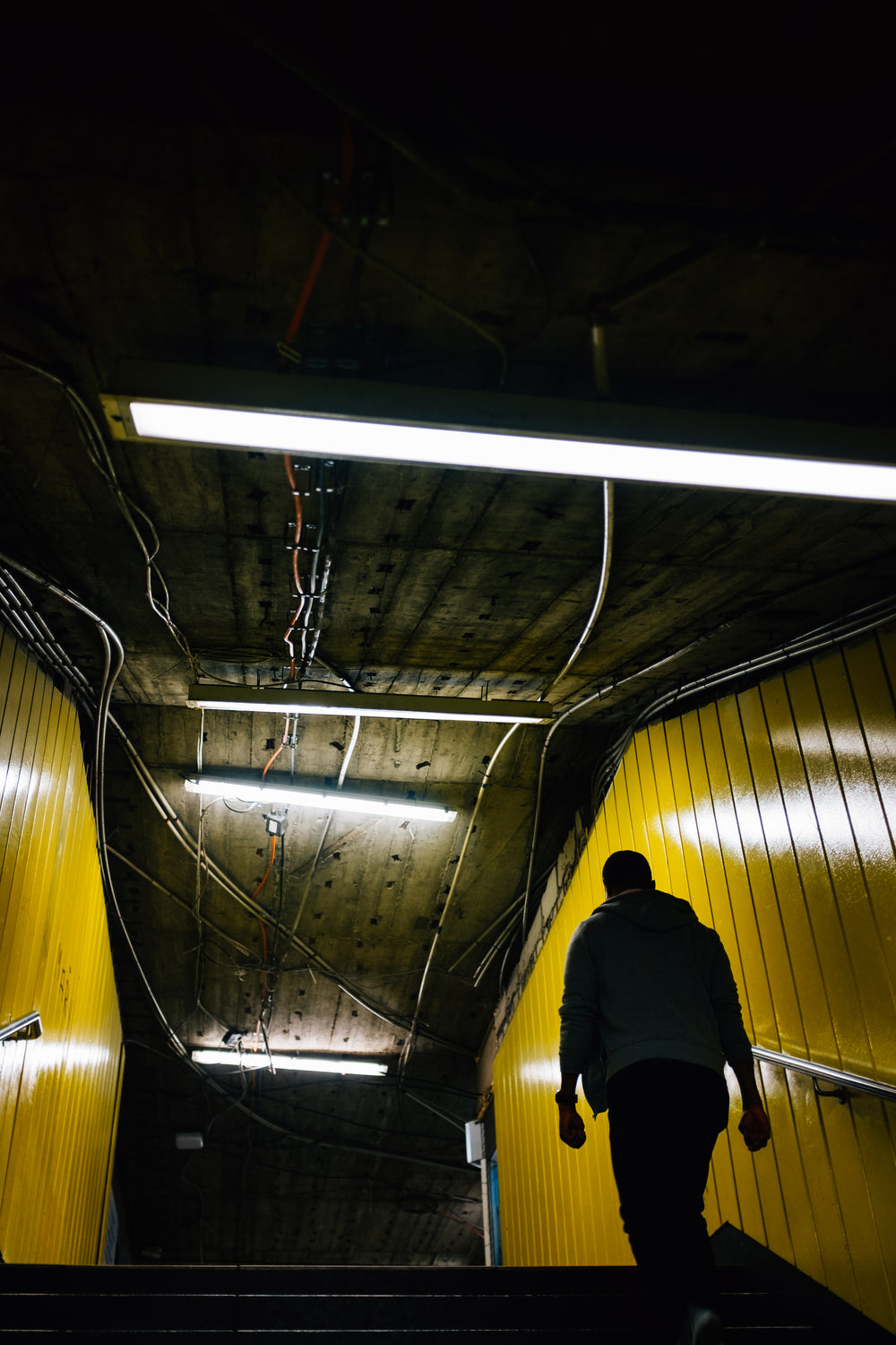 yellow walls in subway exit