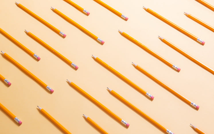 Yellow Writing Pencils Arranged In Lines