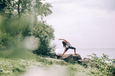 yoga poses on seaside rocks