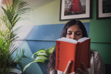 young and modern woman takes time to read