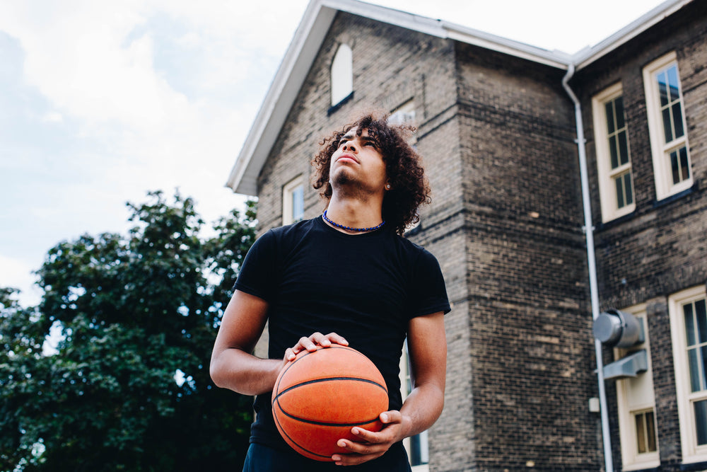 young basketball player looking up