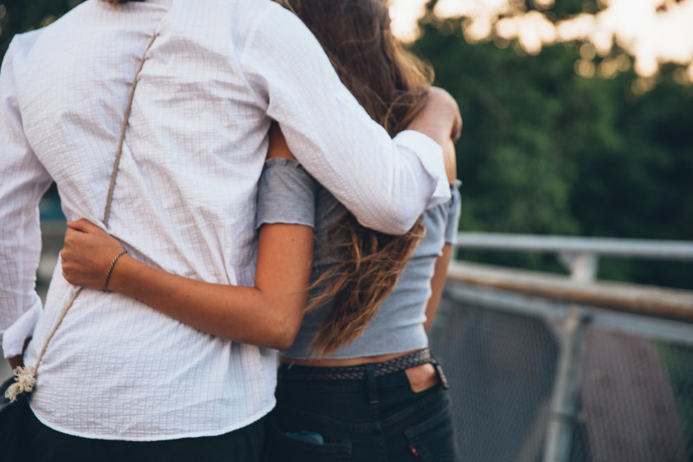 young couple embrace