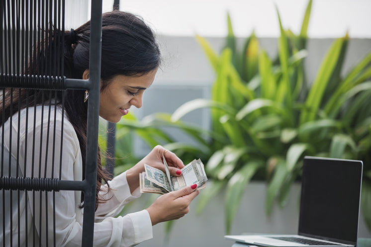 young-entrepreneur-counting-money.jpg?wi