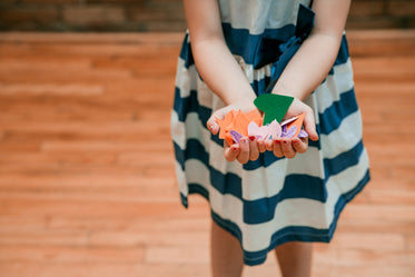 young hands with confetti