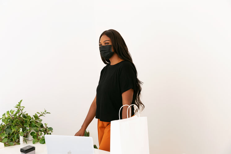 Young Store Owner Behind Her Counter