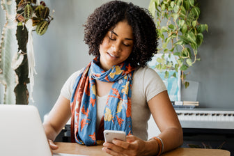 Young Woman Checking Her Phone