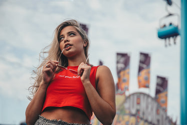 Free Young Woman Holding Sunglasses Image: Browse 1000s of Pics