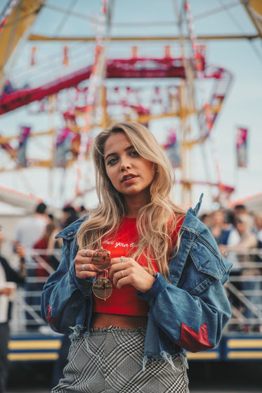 young woman posing at carnival