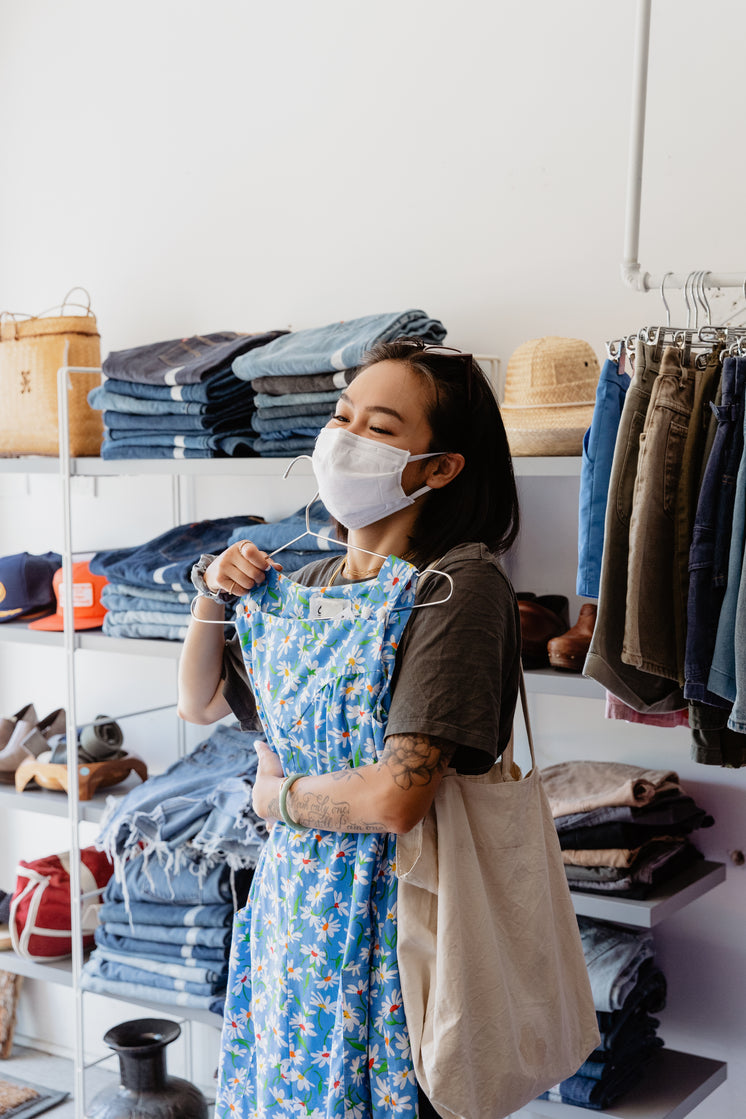 Young Woman Shopping With Face Mask On