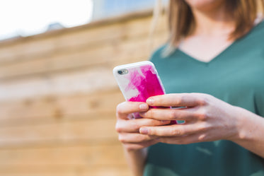 young woman using iphone