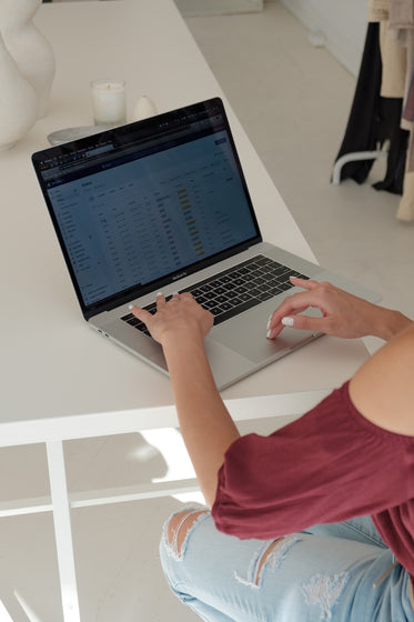 young woman working on her computer